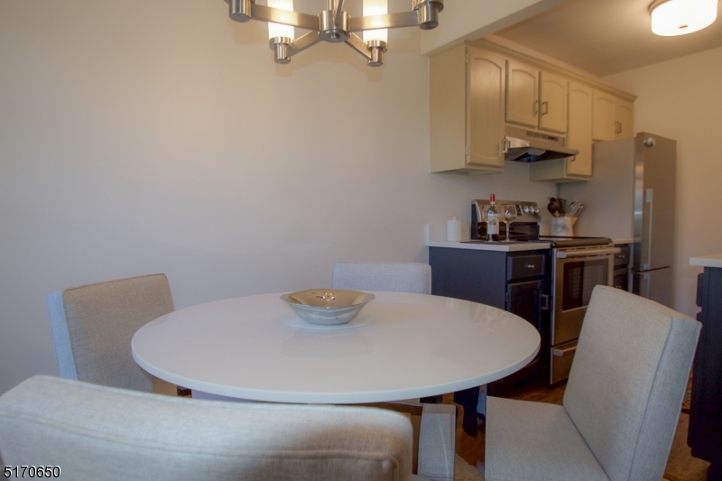 27 Corsa Terrace Ridgewood, NJ 07450 - Photo 8 of 10 a view of a dining room with furniture