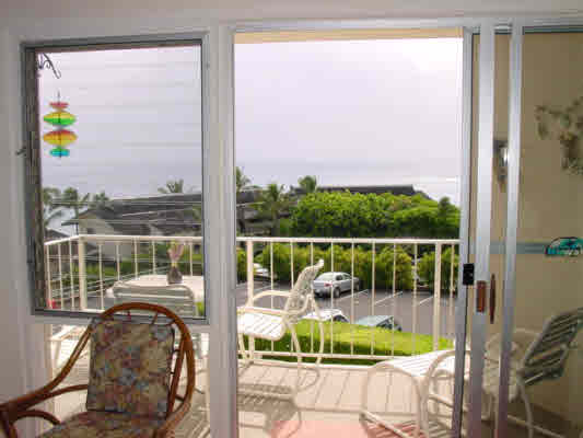 1763 Pe'e Road, Unit 304 Koloa, HI 96756 - Photo 3 of 14 a view of balcony with two chairs and a table