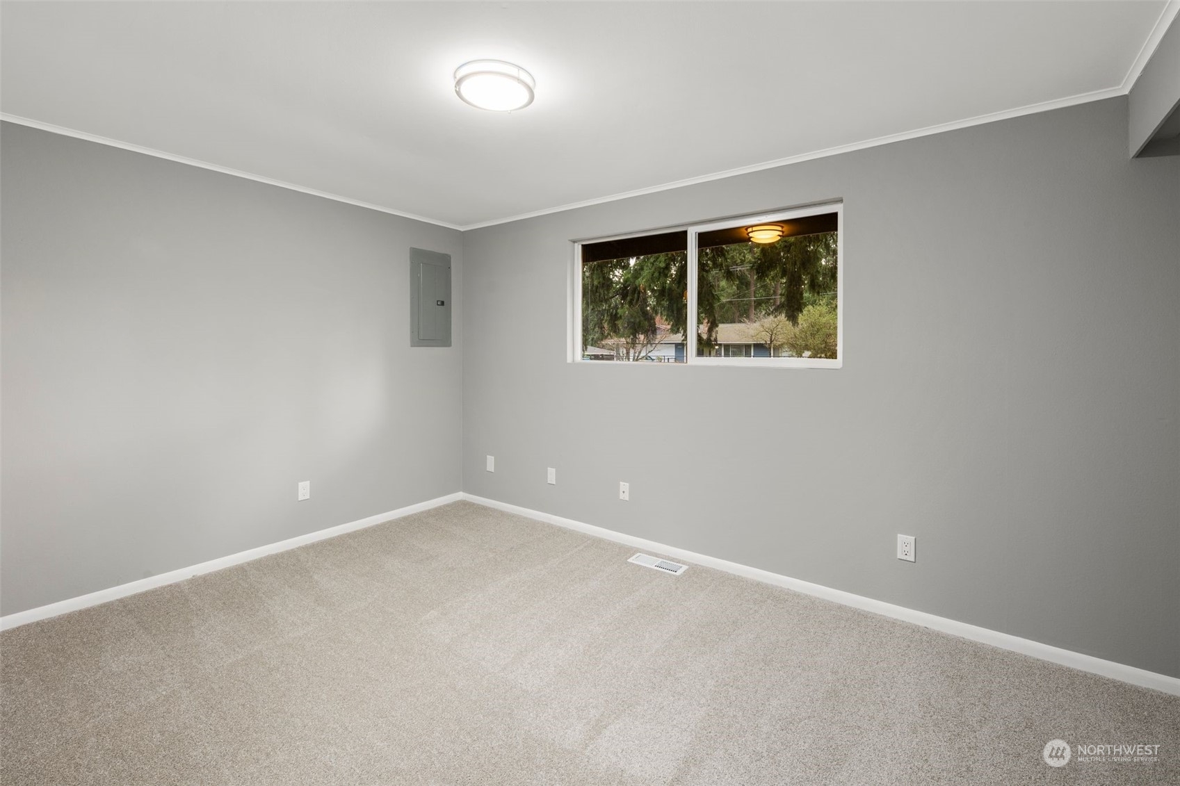 15832 Southeast 144th Street Renton, WA 98059 - Photo 25 of 40 an empty room with a window