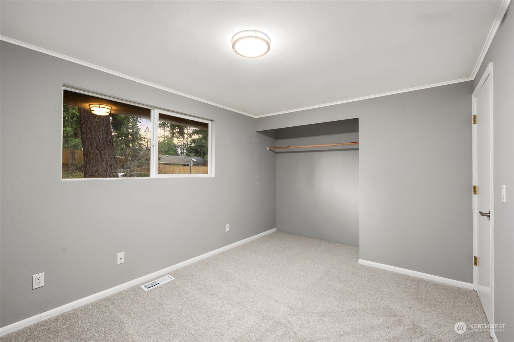 15832 Southeast 144th Street Renton, WA 98059 - Photo 26 of 40 a view of an empty room with a window