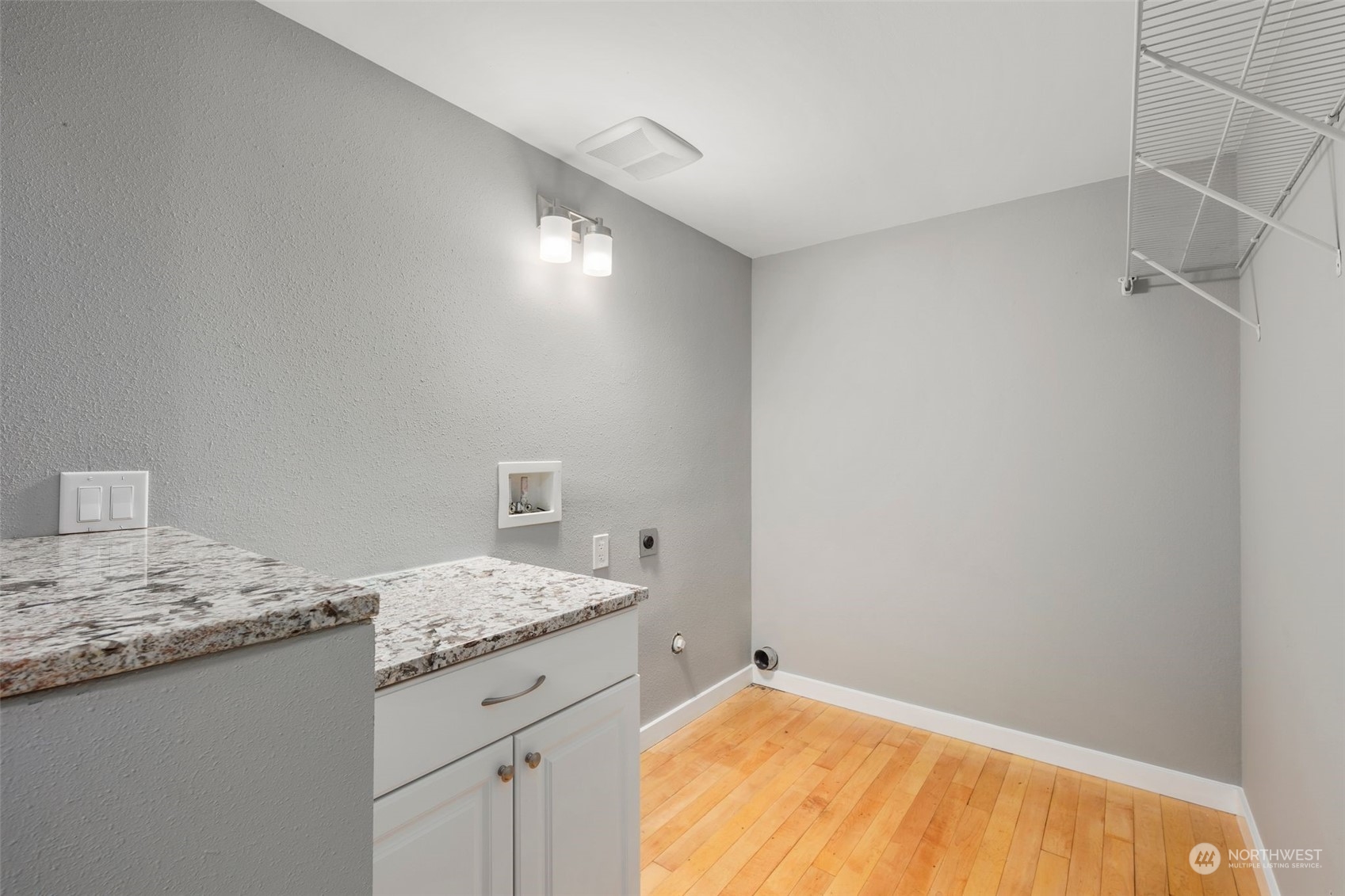 15832 Southeast 144th Street Renton, WA 98059 - Photo 27 of 40 a bathroom with a granite countertop sink and vanity