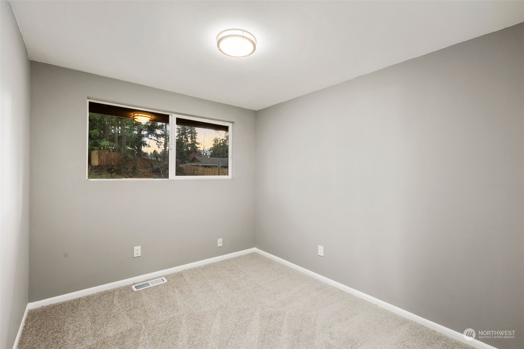 15832 Southeast 144th Street Renton, WA 98059 - Photo 28 of 40 an empty room with windows