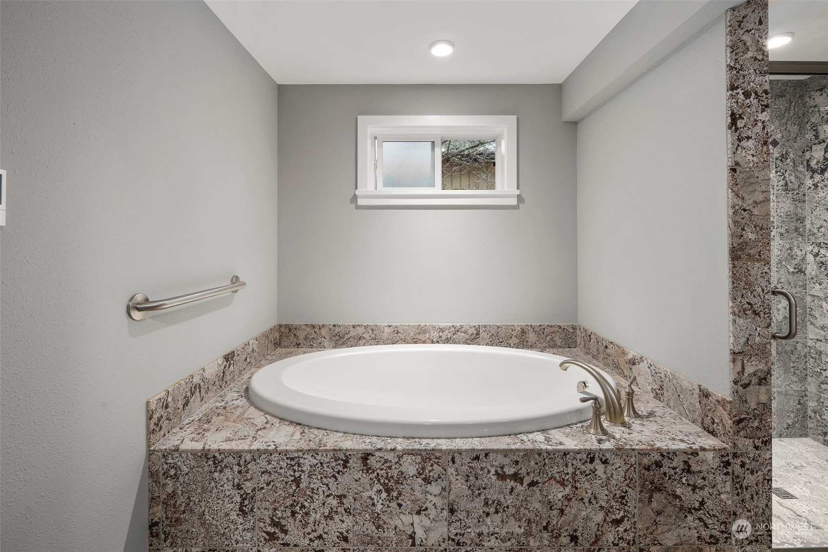 15832 Southeast 144th Street Renton, WA 98059 - Photo 31 of 40 a bathroom with a tub