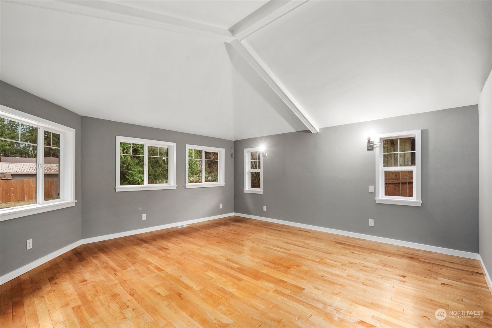 15832 Southeast 144th Street Renton, WA 98059 - Photo 38 of 40 a view of empty room with wooden floor and fan