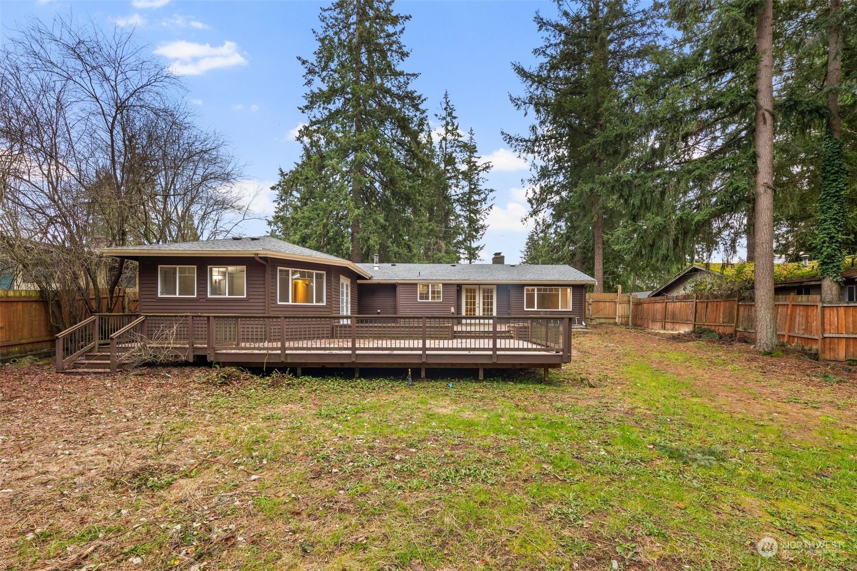 15832 Southeast 144th Street Renton, WA 98059 - Photo 7 of 40 a view of a house with a yard