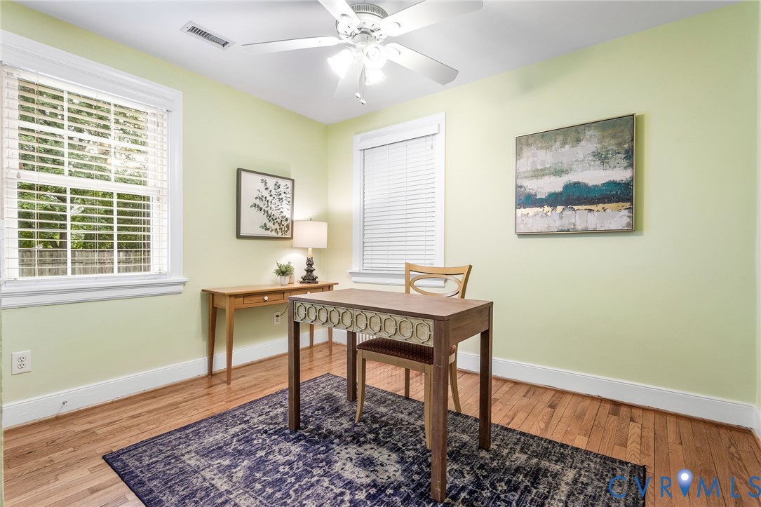 1100 Skipwith Road Henrico, VA 23229 - Photo 17 of 34 a view of a workspace with furniture and a window