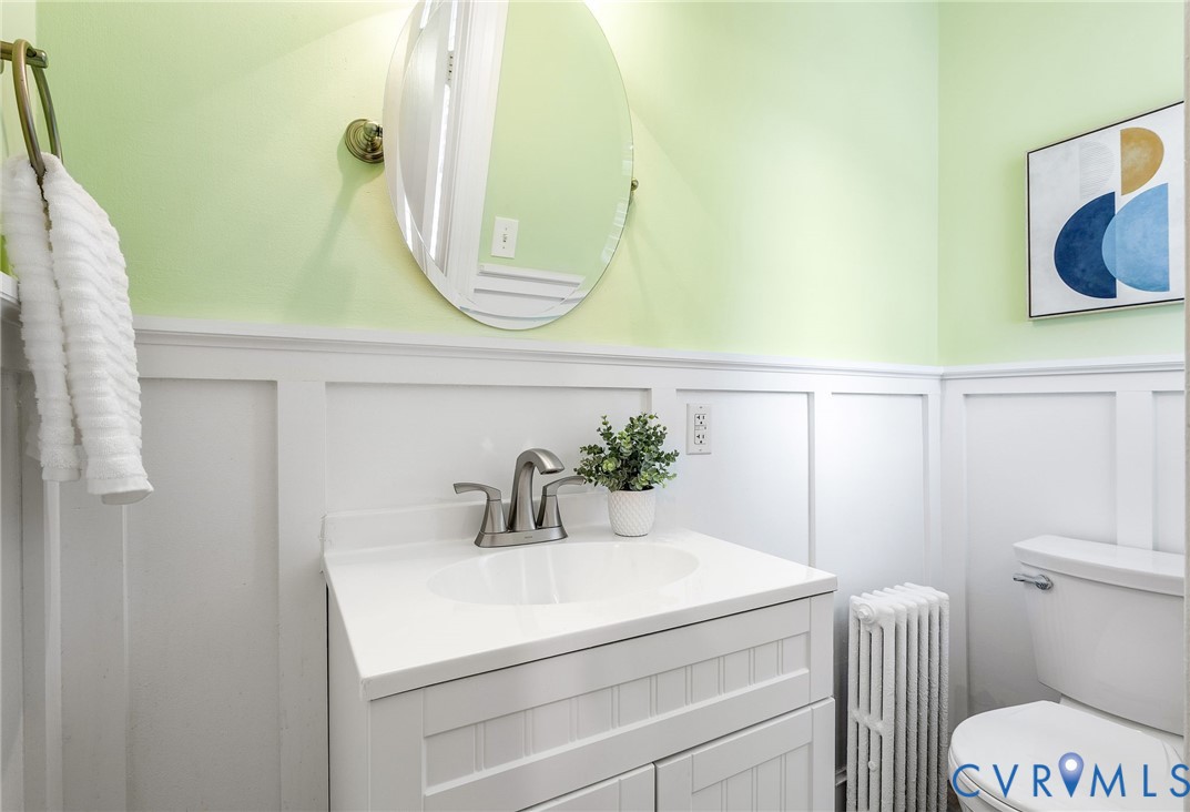 1100 Skipwith Road Henrico, VA 23229 - Photo 18 of 34 a bathroom with a sink and a mirror