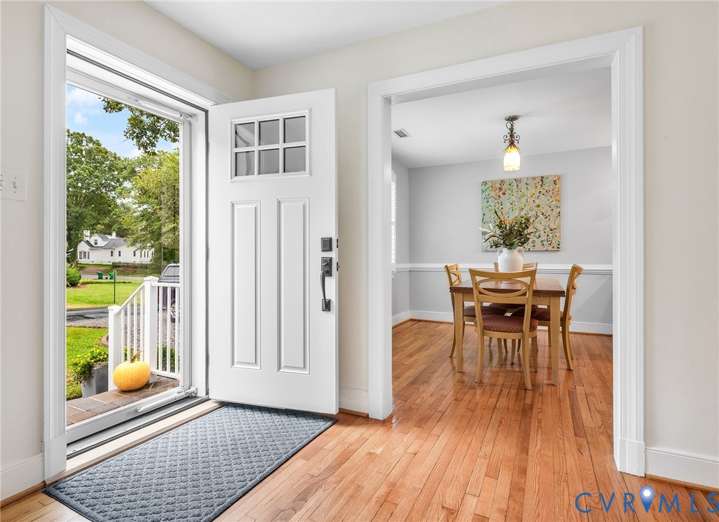 1100 Skipwith Road Henrico, VA 23229 - Photo 4 of 34 a view of a dining room with furniture window and wooden floor