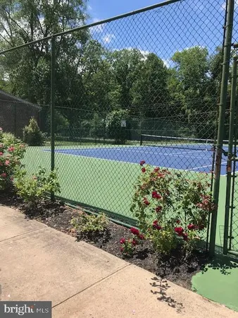 a view of swimming pool with a yard