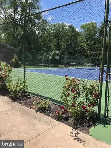 a view of swimming pool with a yard