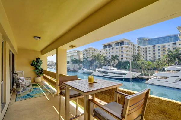 a view of a patio with swimming pool