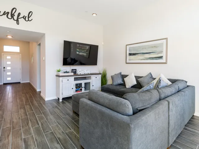 a table with a vase and flowers on it