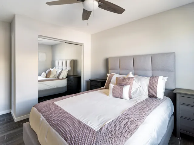 a bathroom with a toilet and a bathtub