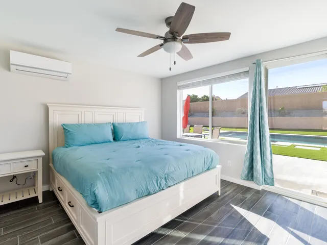 a bathroom with a bathtub and a toilet