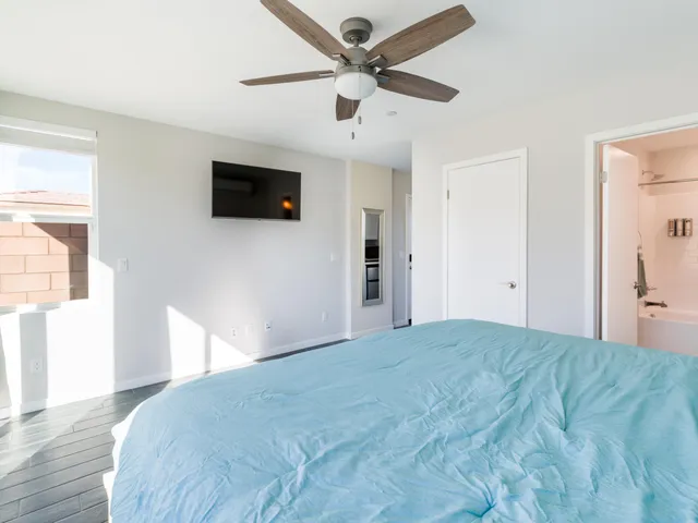a view of a house with swimming pool and a yard