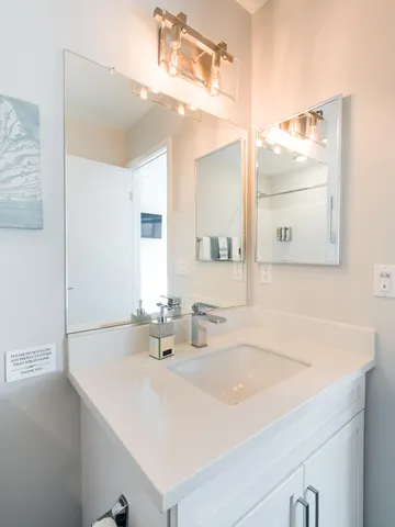 a view of pool with lawn chairs and umbrella