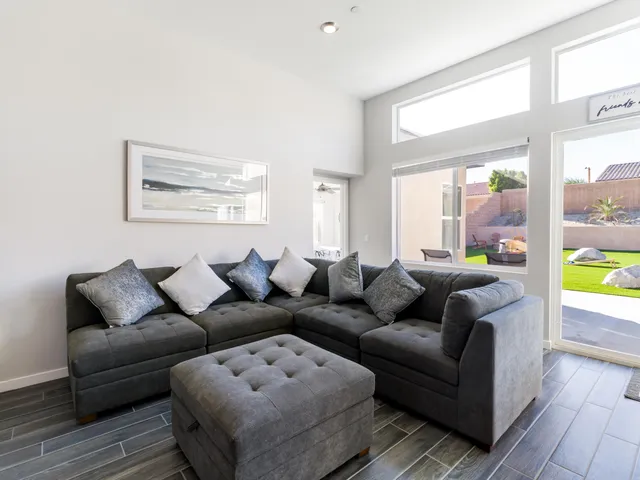 a view of a dining room with furniture window and outside view