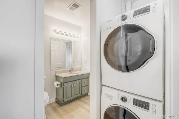 a utility room with dryer and washer