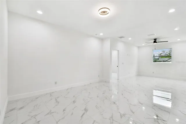 an empty room with entrance and door