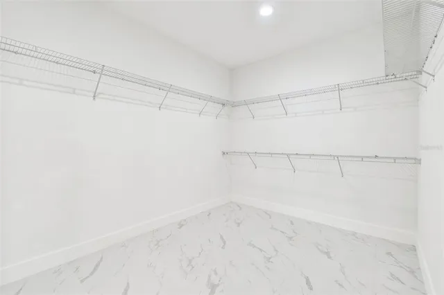 a view of a room with racks on the wall