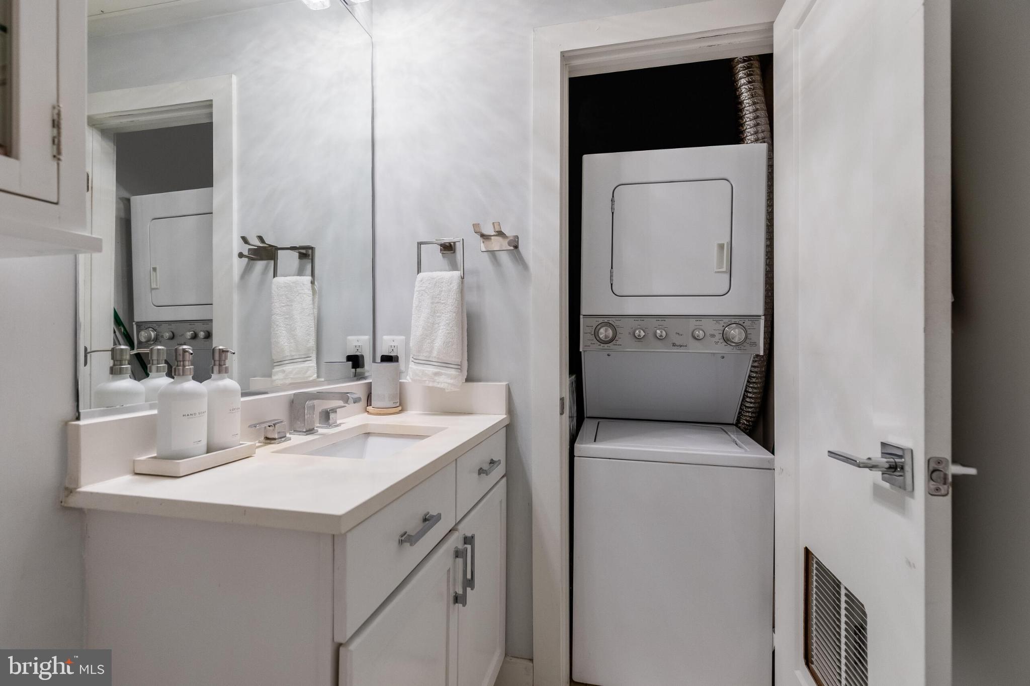 1412 Chapin Street Northwest, Unit 5 Washington, DC 20009 - Photo 16 of 23 a utility room with dryer and washer