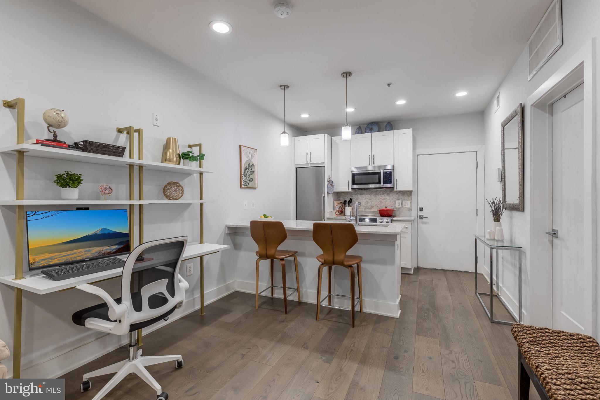 1412 Chapin Street Northwest, Unit 5 Washington, DC 20009 - Photo 7 of 23 a view of a dining room with furniture