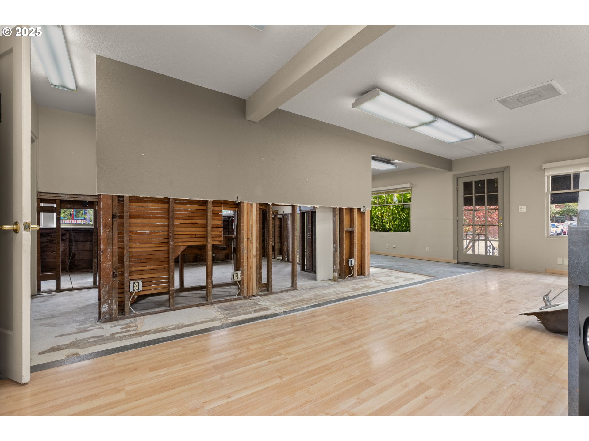 6055 East Burnside Street Portland, OR 97213 - Photo 17 of 32 a view interior of a house with wooden floor