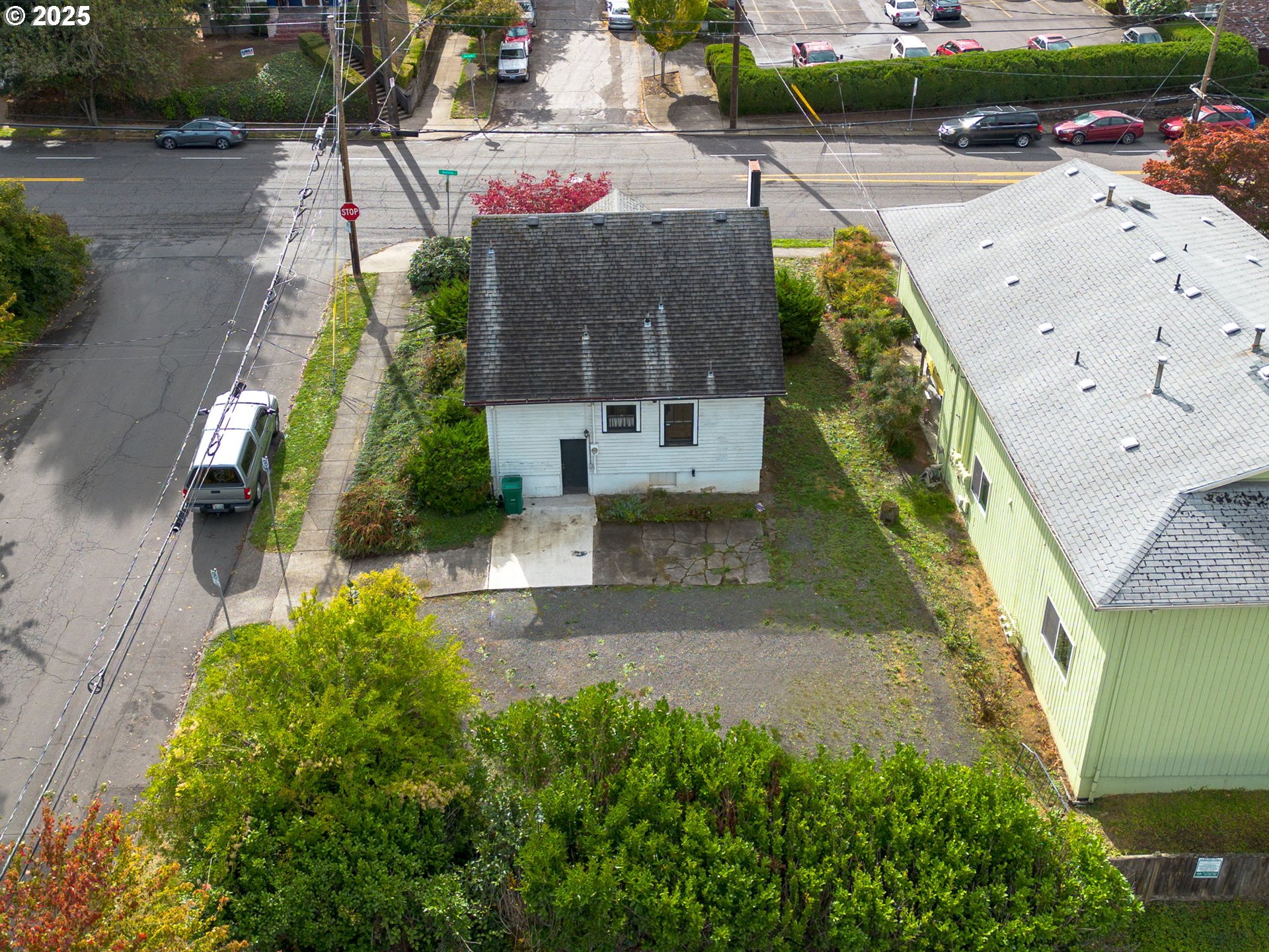 6055 East Burnside Street Portland, OR 97213 - Photo 4 of 32 an aerial view of a house with a garden