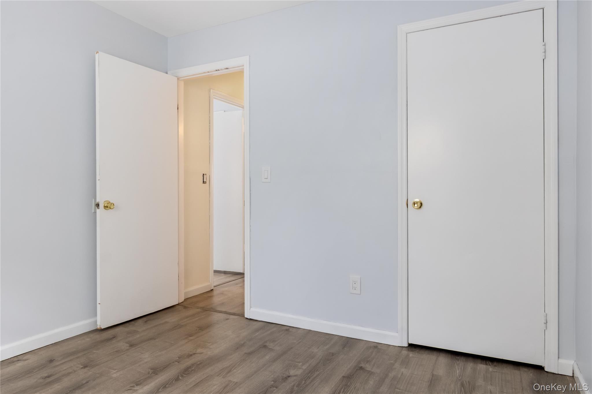7 Lexington Hills Road, Unit 8 Harriman, NY 10926 - Photo 6 of 17 a view of an empty room with wooden floor