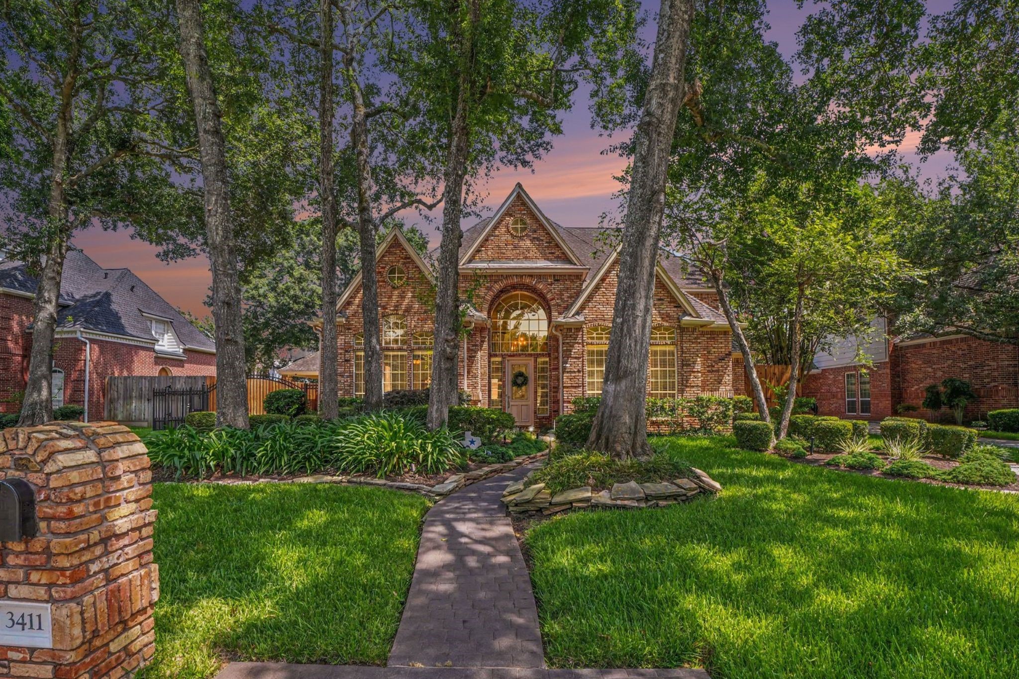 3411 Fir Forest Drive Spring, TX 77388 - Photo 2 of 39 Beautiful custom home featuring a stamped concrete pathway leading up to the front door.