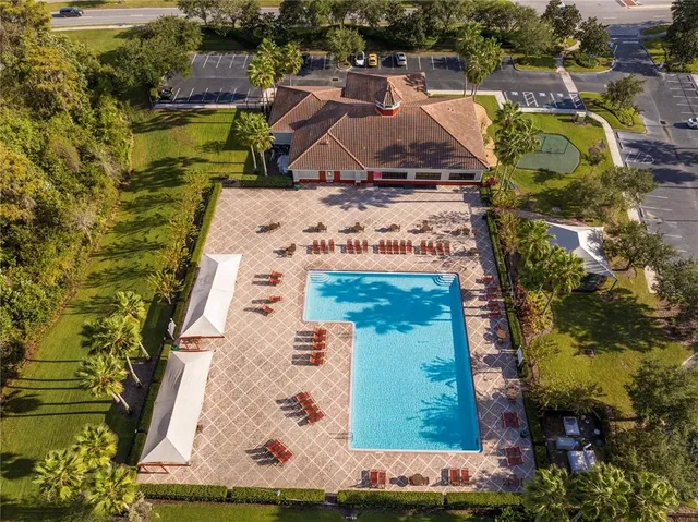 a living room with furniture a table and a window
