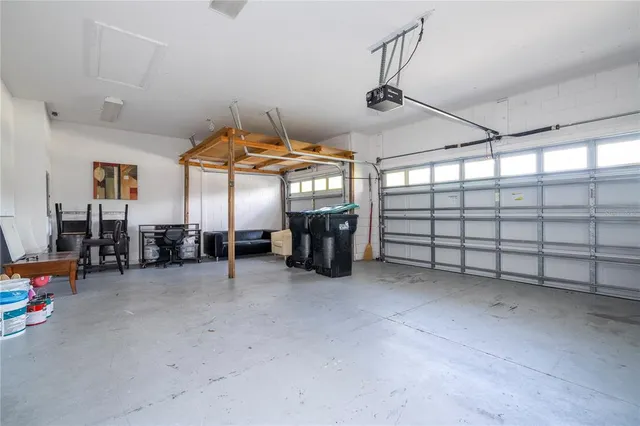 a bedroom with two beds and a window