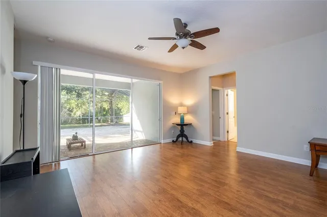 a bathroom with a shower and a glass door