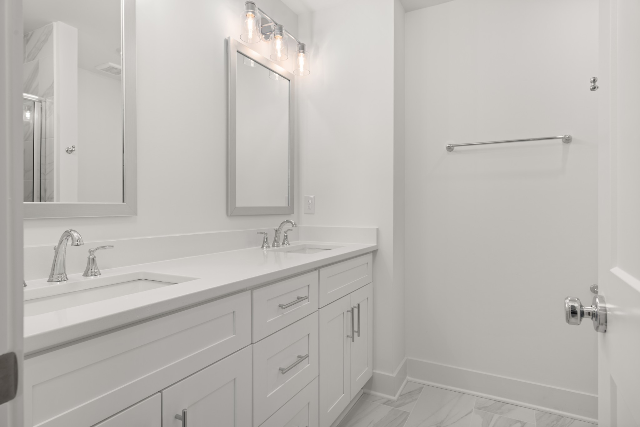 249 Nesbitt Lane Madison, TN 37115 - Photo 18 of 35 a bathroom with a sink and a mirror