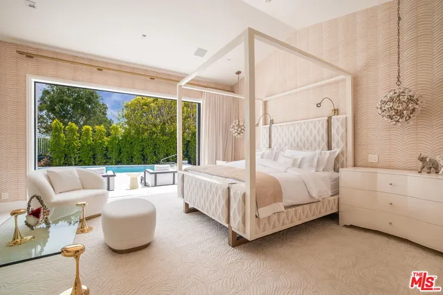 a bed room with a bed and a couch