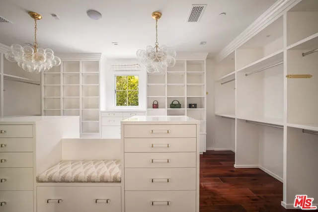 a kitchen with a refrigerator and window
