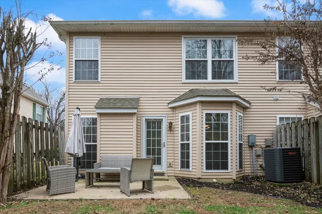 a house view with a outdoor space