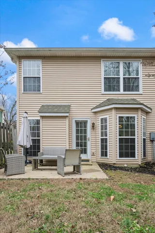 a house that has a window in front of it