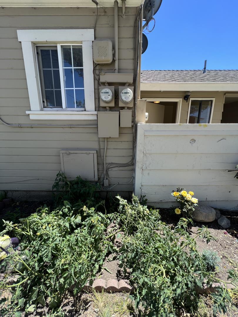 101 Smith Street Salinas, CA 93905 - Photo 11 of 26 a view of a house with a flower garden