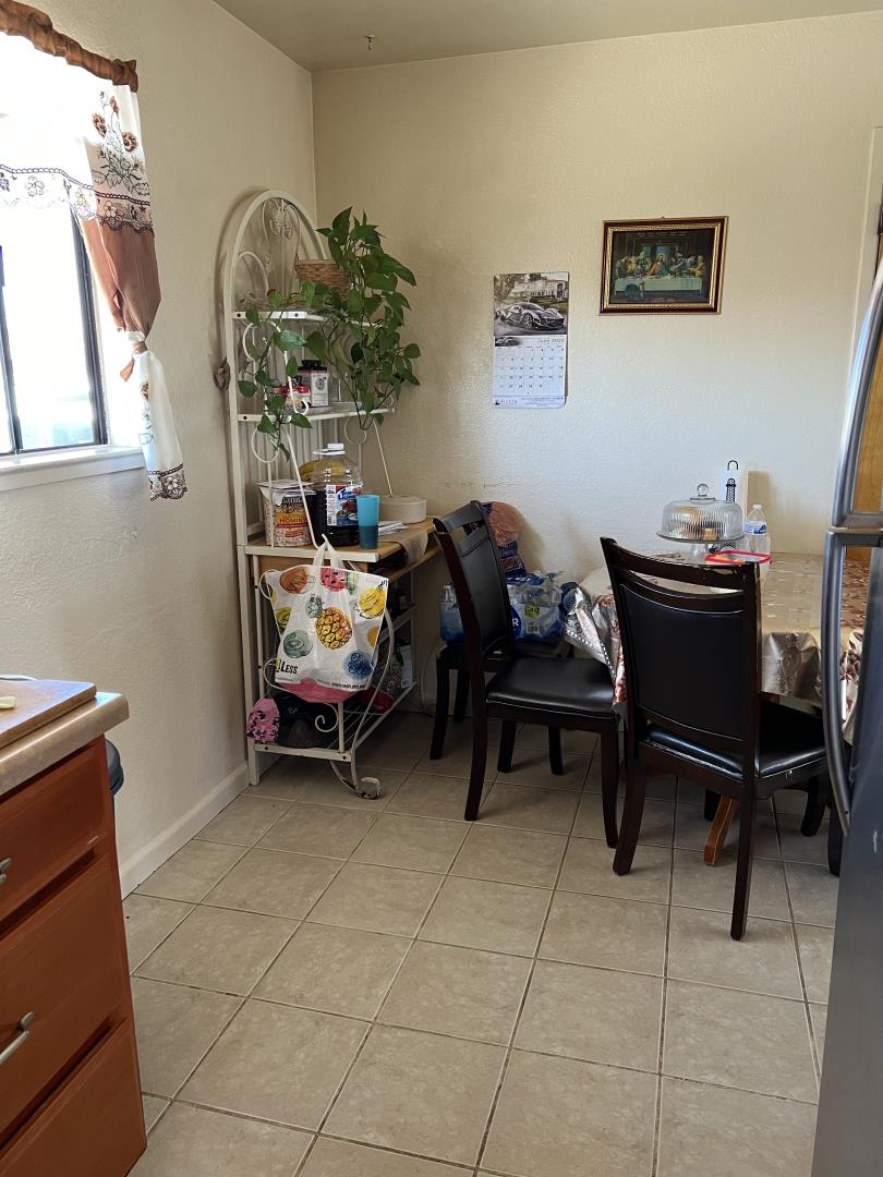 101 Smith Street Salinas, CA 93905 - Photo 16 of 26 a living room with furniture and a potted plant