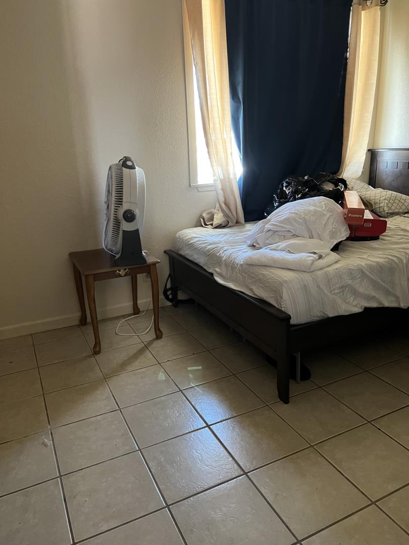 101 Smith Street Salinas, CA 93905 - Photo 18 of 26 a bedroom with a bed and a window