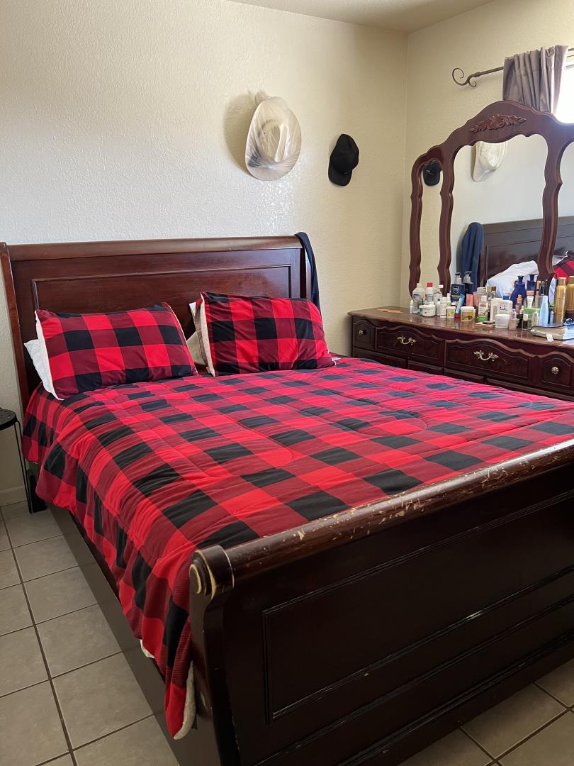 101 Smith Street Salinas, CA 93905 - Photo 19 of 26 a bedroom with a bed and window