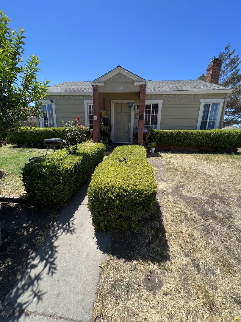 101 Smith Street Salinas, CA 93905 - Photo 2 of 26 a front view of a house with a yard