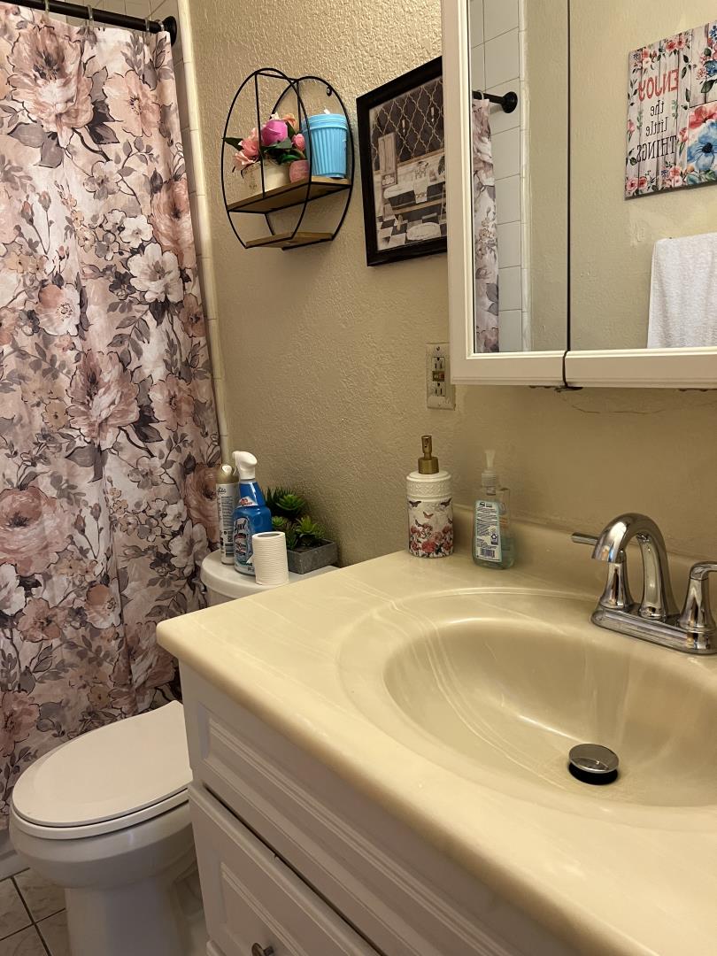 101 Smith Street Salinas, CA 93905 - Photo 25 of 26 a bathroom with a sink and a toilet