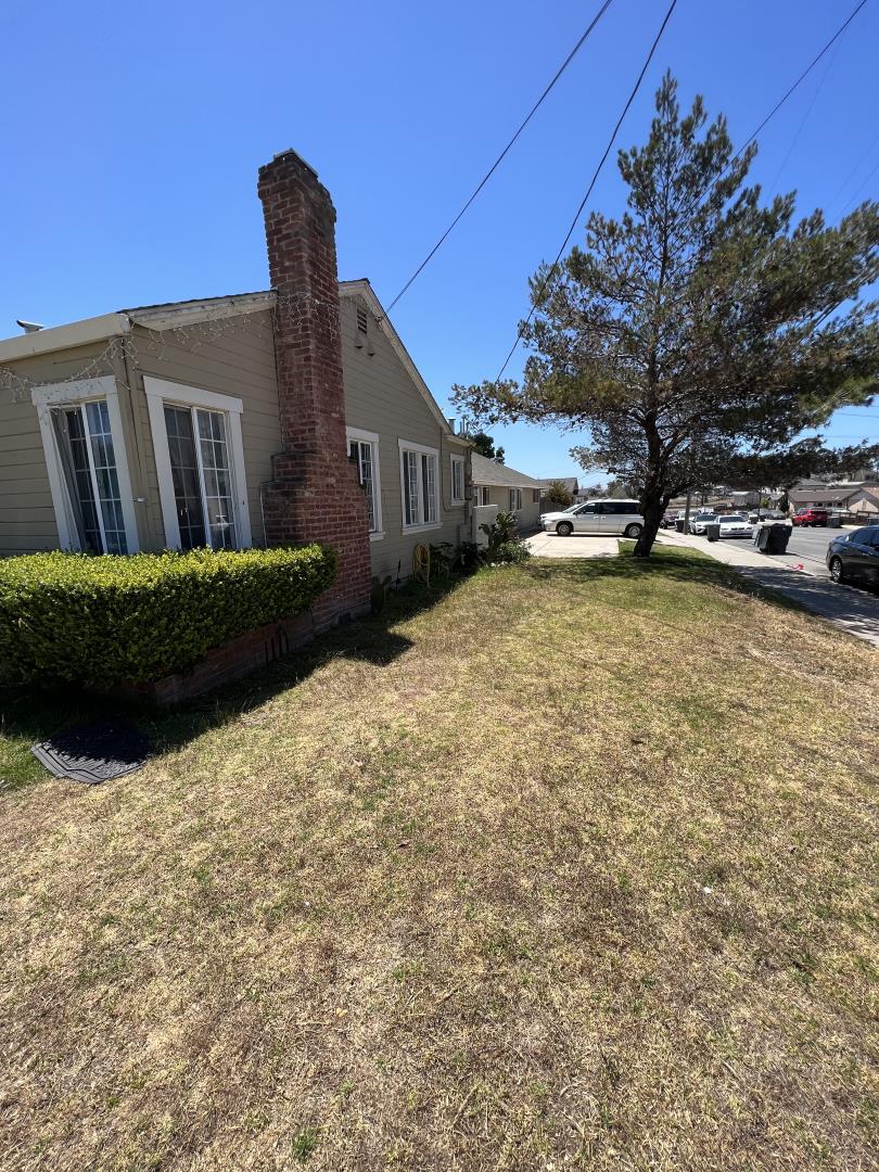 101 Smith Street Salinas, CA 93905 - Photo 3 of 26 a front view of a house with a yard