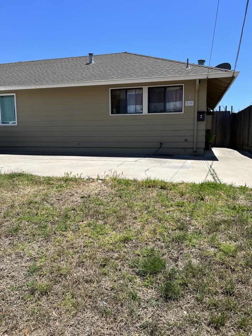 101 Smith Street Salinas, CA 93905 - Photo 5 of 26 a house with yard in front of it