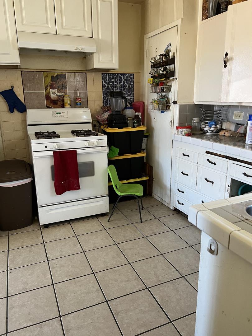 101 Smith Street Salinas, CA 93905 - Photo 9 of 26 a kitchen with cabinets and appliances