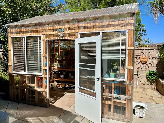 a room with wooden racks