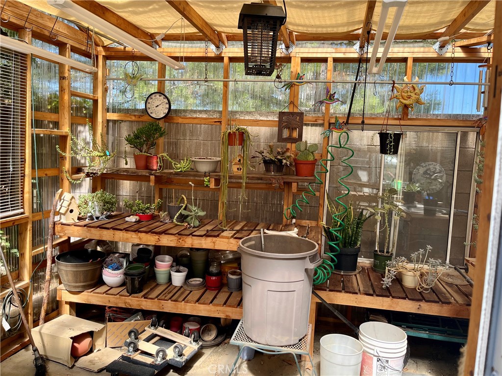 1244 Katherine Court Beaumont, CA 92223 - Photo 15 of 19 a room with wooden racks