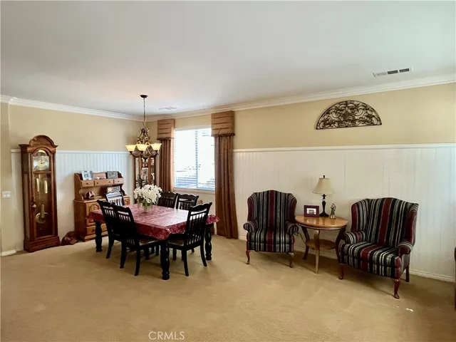 a view of a livingroom with furniture and window
